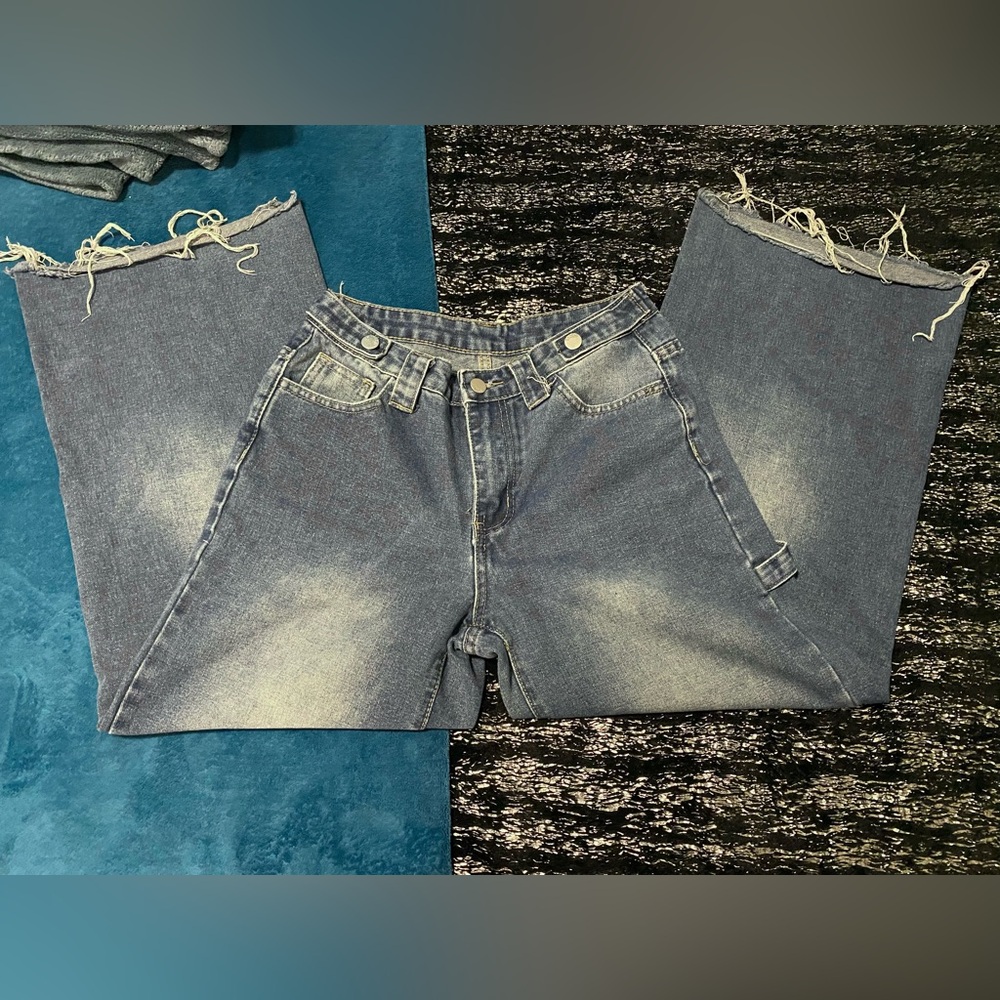Distressed high-waisted wide-leg jeans